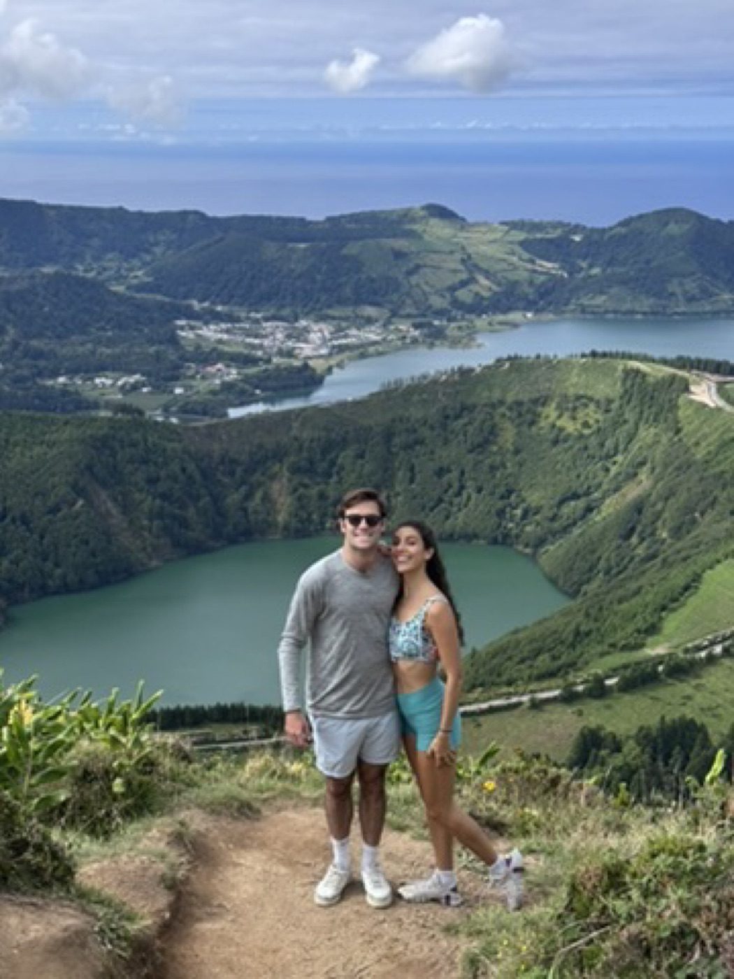Couple portrait on a crater-lake ridge