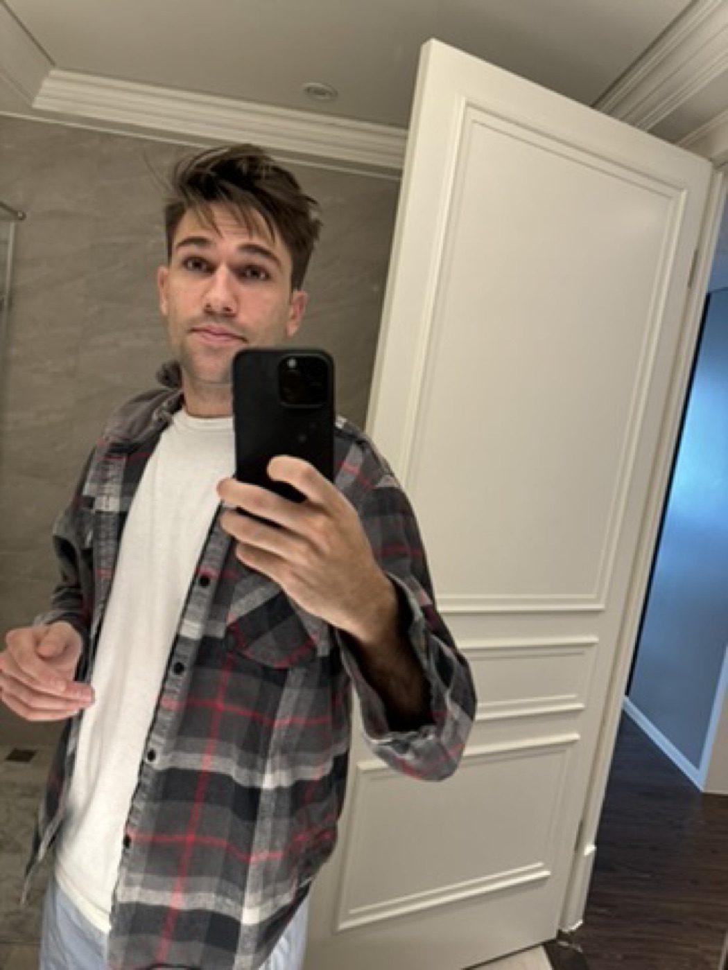 Casual flannel mirror selfie before heading out