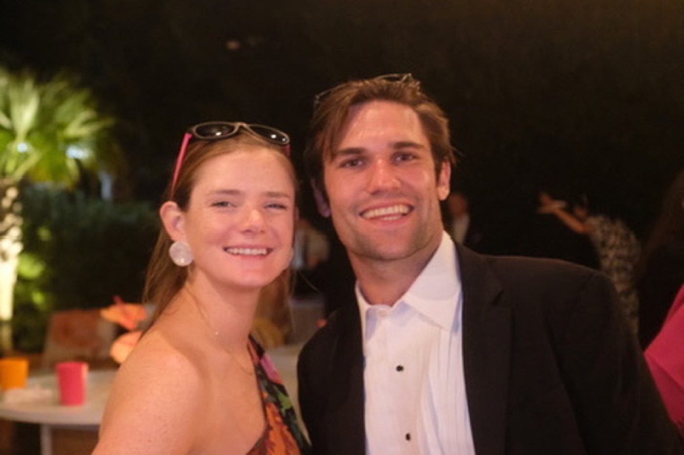 Smiling couple close-up at a formal evening party