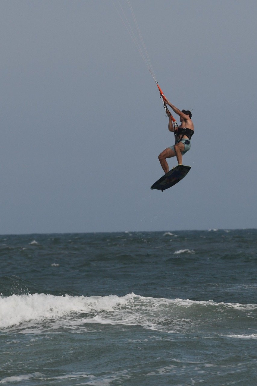 Sent it, board swung near vertical over the spray