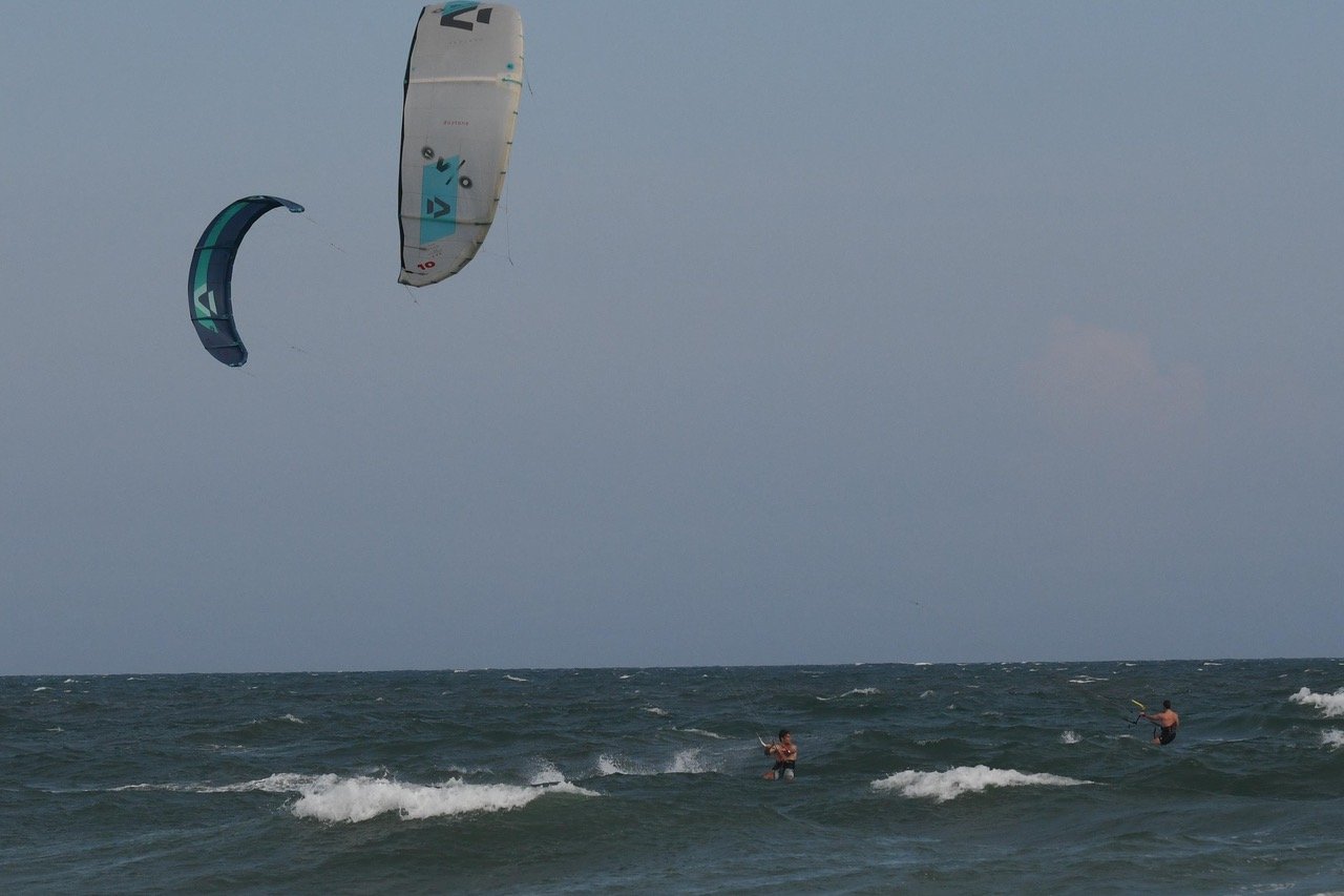 Two kites up, two riders out past the break