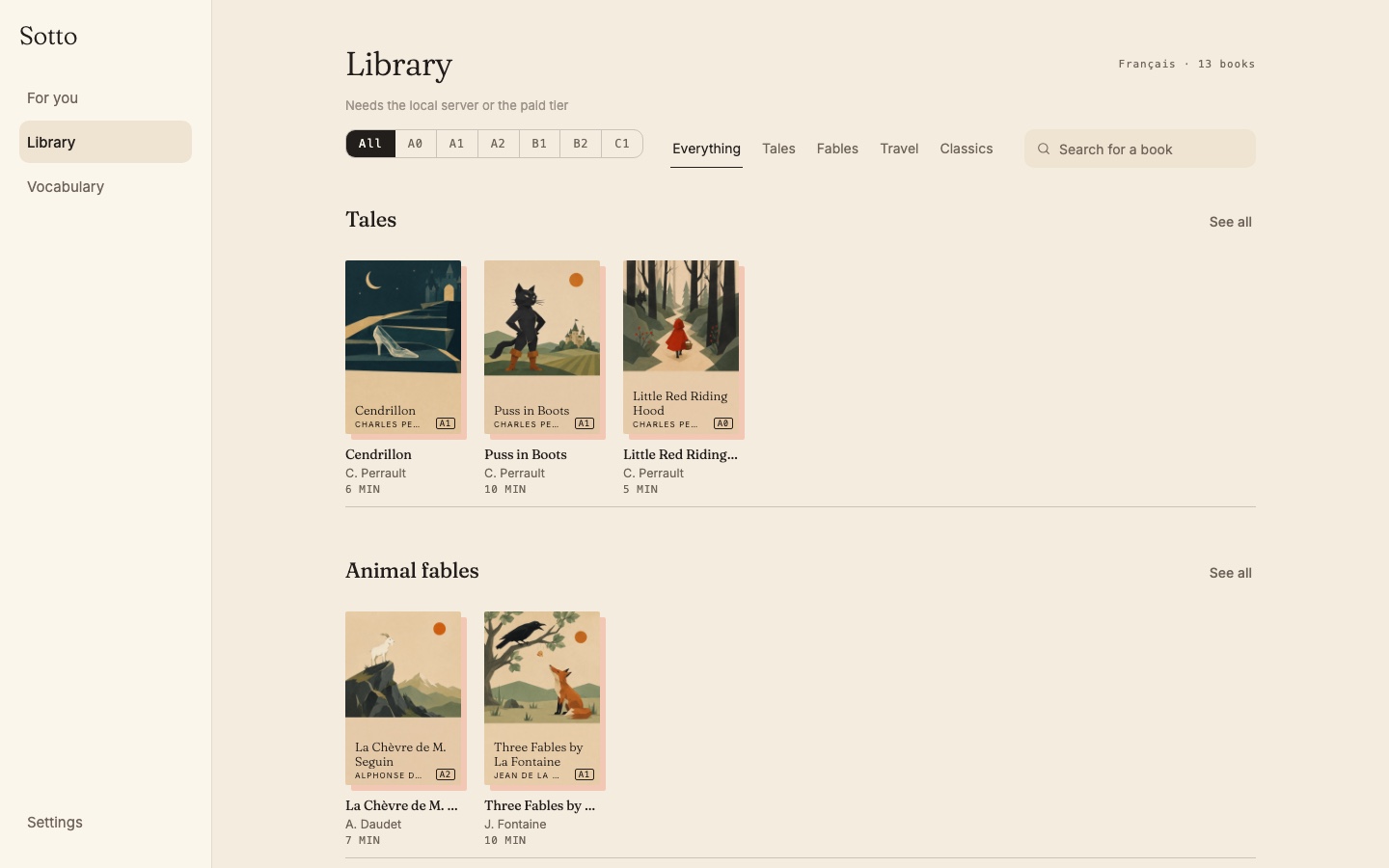 Sotto’s French library with paper-cut book covers for fairy tales and animal fables, level filters, and a search box